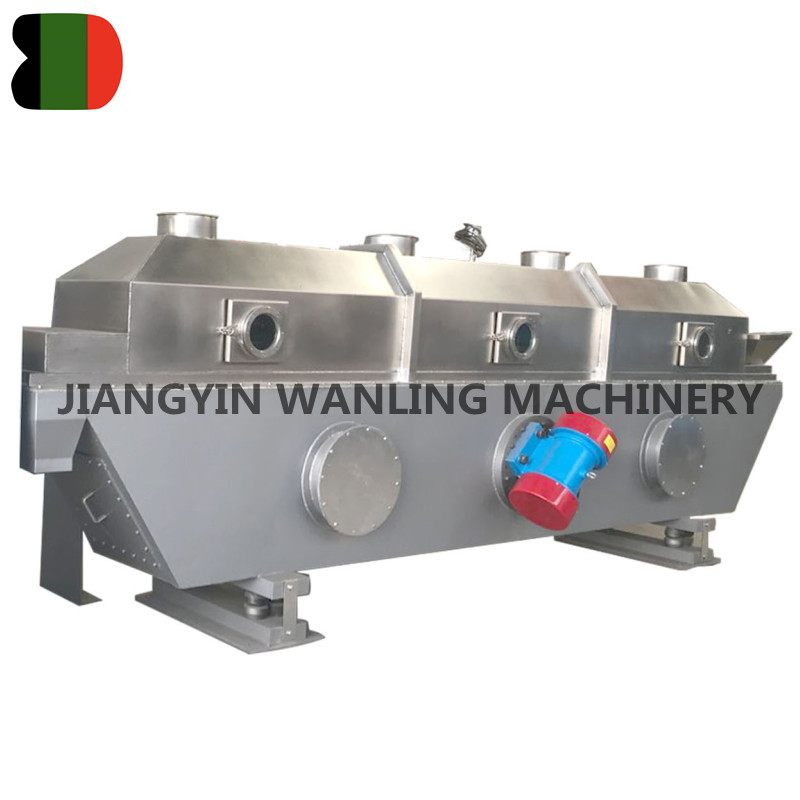 What challenges arise in drying heat-sensitive or sticky materials in vibrating fluid bed dryers