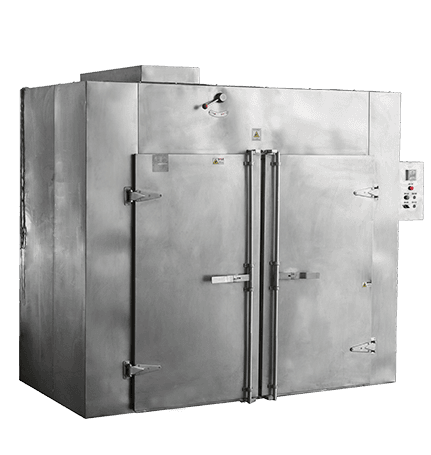 What are the advantages and disadvantages of using electric versus gas-powered tray dryers?
